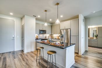 Aura Avant Apartments in Lewisville, Texas Model Kitchen with Island